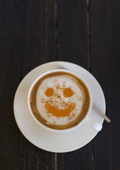 Smile face on cooffee cup