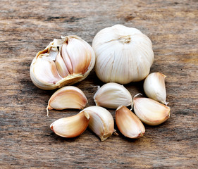 Still-life with garlic cloves on a wood