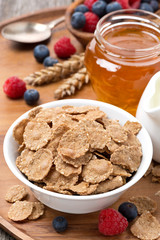 cereal flakes, milk and honey for breakfast
