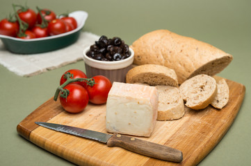Bread and cheese/ bread and ripe tomatoes
