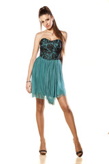 attractive girl posing in short evening dress