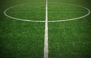 Fototapeta na wymiar Soccer ball green grass field