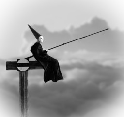 Strange person in black cloak fishing in the air