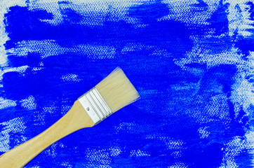 paint brush on blue painting background