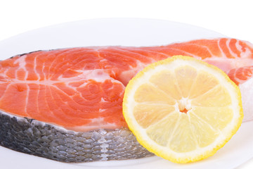 salmon with lemon on a plate