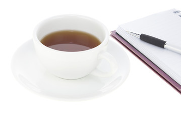 Coffee cup and notebook isolated  on white background
