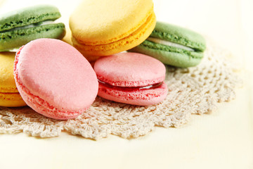 Gentle macaroons on table close-up