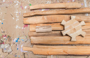 Wooden toy blocks on wooden background