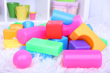 Colorful plastic toys in children room
