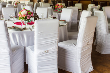 an image of tables setting at a luxury wedding hall