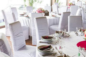 an image of tables setting at a luxury wedding hall