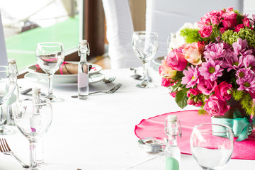 an image of tables setting at a luxury wedding hall