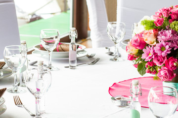 an image of tables setting at a luxury wedding hall