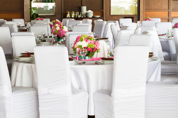 an image of tables setting at a luxury wedding hall