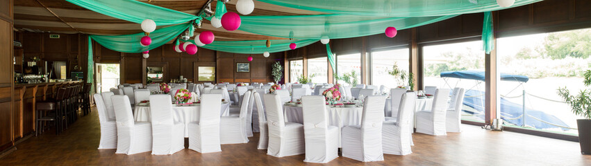 an image of tables setting at a luxury wedding hall