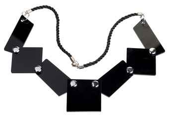 Necklace of black flat plates, isolated