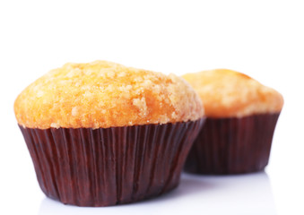 Tasty muffins isolated on white