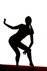silhouette woman on toe legs one hand back