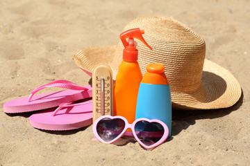 Thermometer in sand close-up