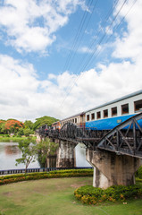 Train on the bridge over river Kwai in Kanchanaburi, Thailand