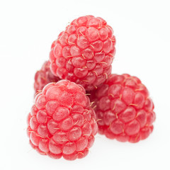 red raspberry lying in form of pyramid