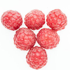 red raspberry lying in form of pyramid