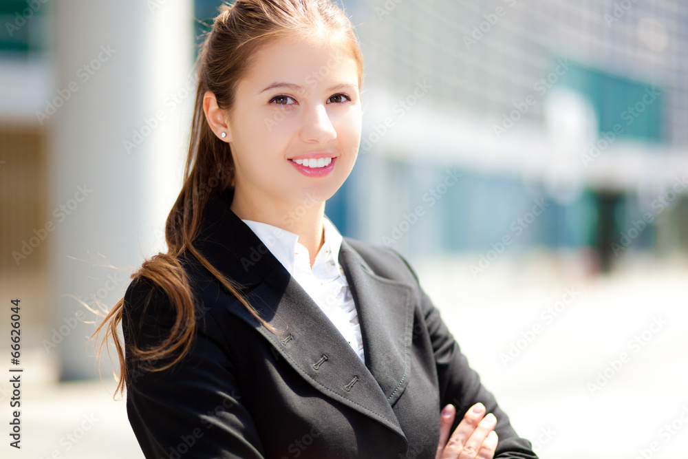 Sticker Smiling businesswoman in urban setting