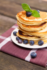 Delicious pancakes with blueberry and mint