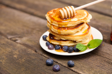 Delicious pancakes with blueberry and mint