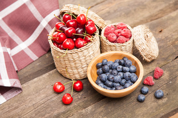 Fresh berries on a wooden table
