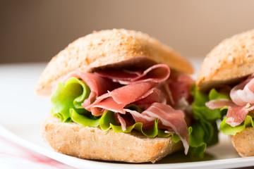 Prosciutto sandwich on plate