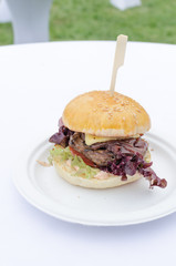 Beef burger with herb butter