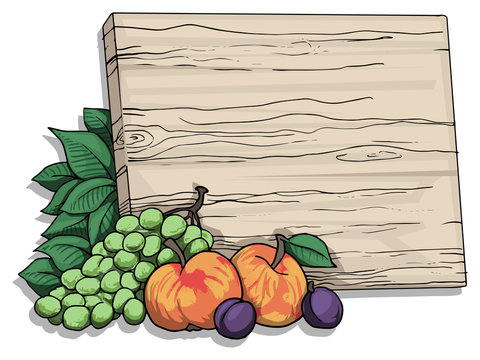 wooden writing board with various fruit around it