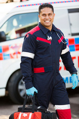 paramedic carrying portable equipment © michaeljung