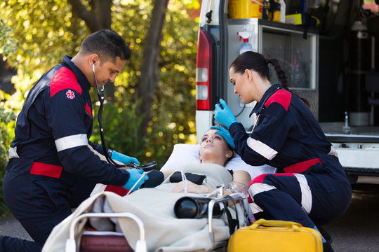 paramedics rescuing young patient