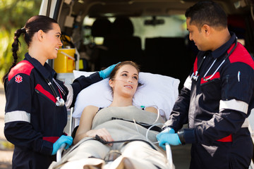 friendly paramedic comforting patient