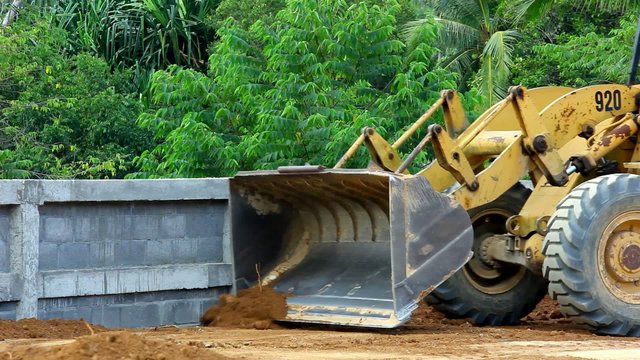 Earthmover dozer doing earthmoving works outdoors. Video