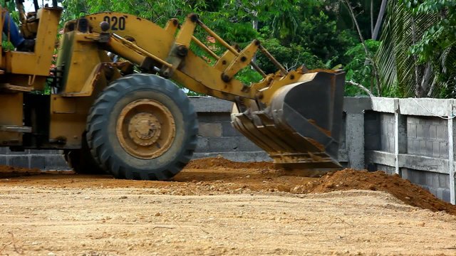 Earthmover dozer doing earthmoving works outdoors. Video