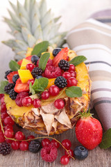 fruit salad in pineapple bowl