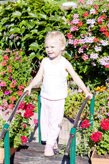 little girl in garden