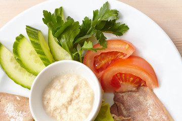 Slices of boiled beef tongue