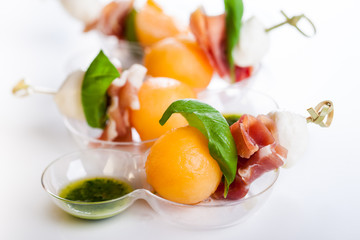 melon,mozzarella and prosciutto on skewers