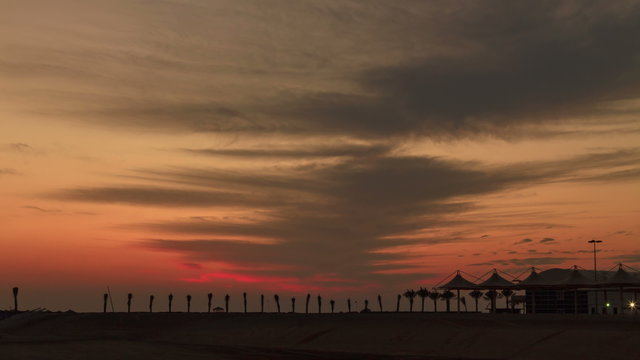 Amazing  sunset timelapse on the beach in Dubai
