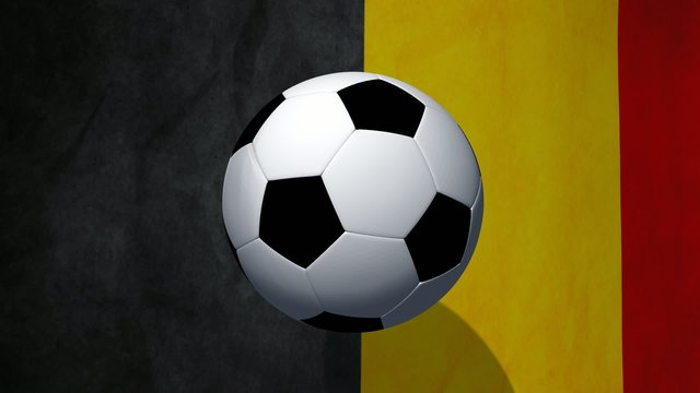 Soccer ball rotates on animated belgium flag