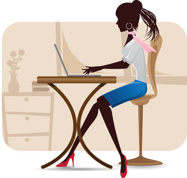 silhouette of working woman with laptop
