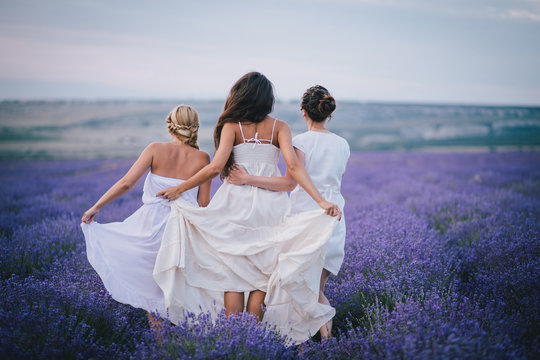 Three Women Posing In A Lavender Field