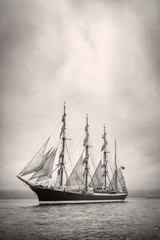Fototapeta premium Old ship with white sales in black and white