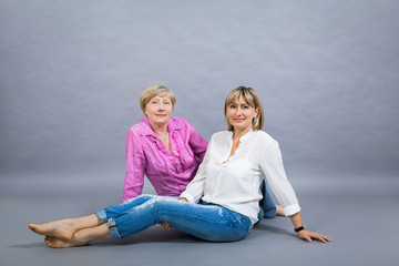 Senior lady with her middle-aged daughter