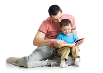 father reading a book to kid