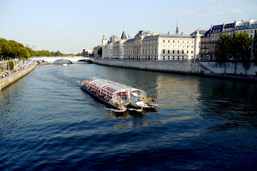 Tourism boat on the Seine river in Paris